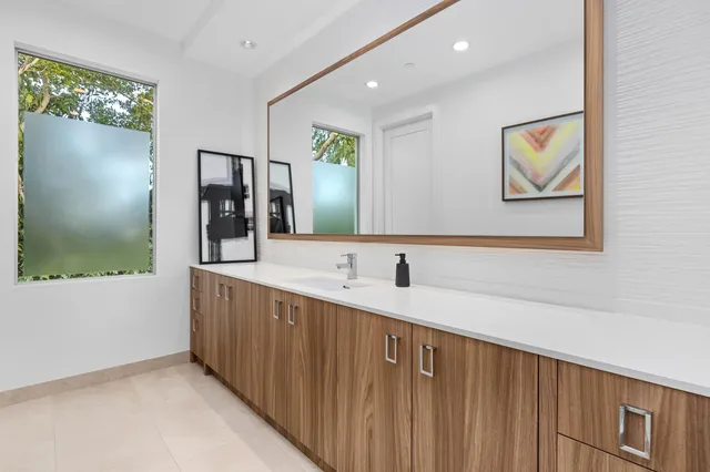 a kitchen with a stove and cabinets