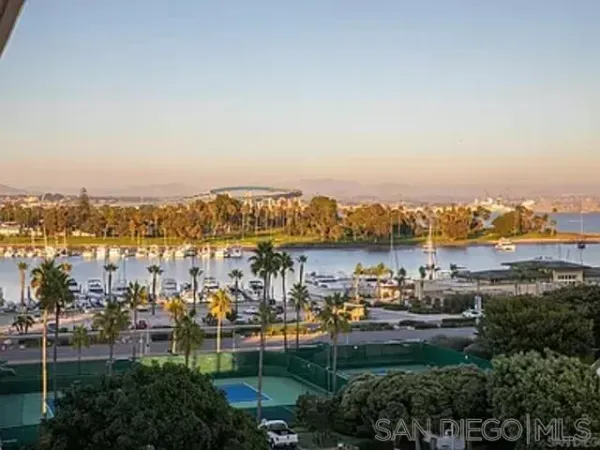 a view of a lake with building in front of it