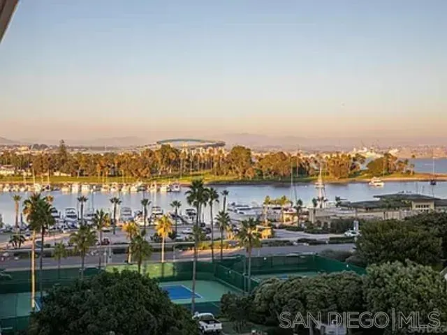 a view of a lake with building in front of it