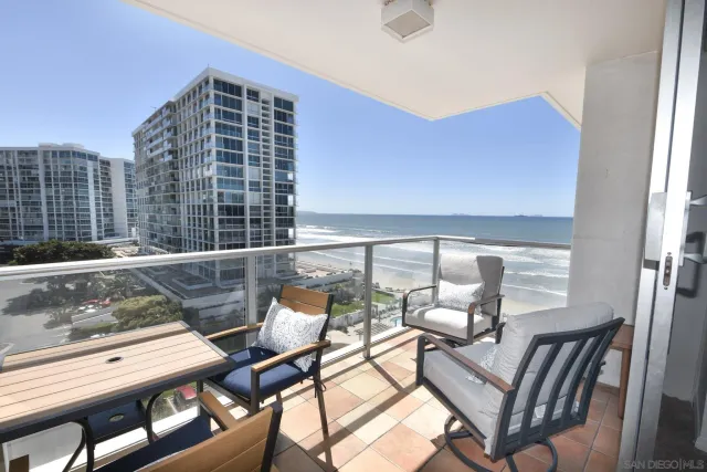 a view of swimming pool with outdoor seating