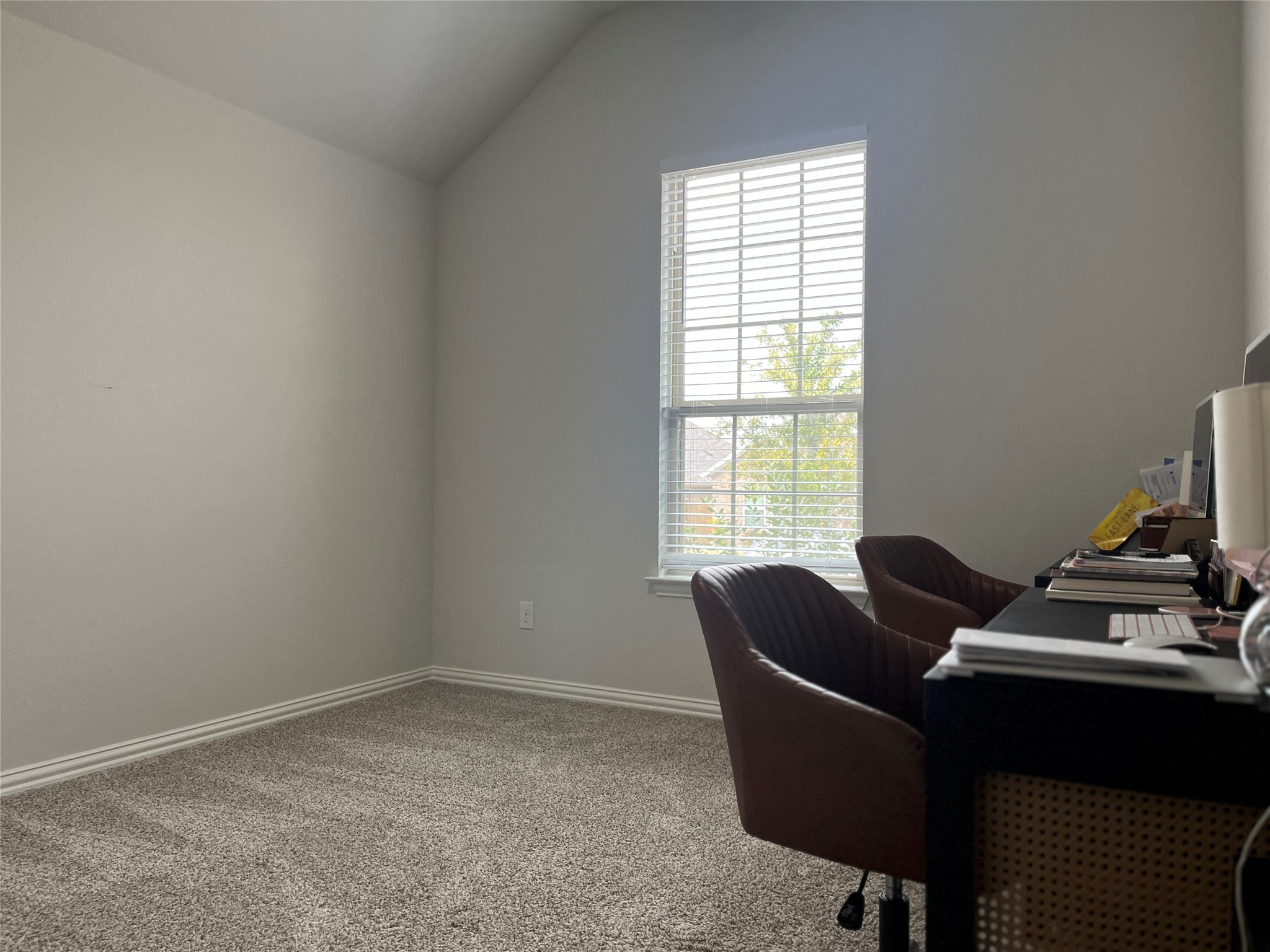 1080 Leadtree Loop Buda, TX 78610 - Photo 17 of 25 a living room with furniture and a window