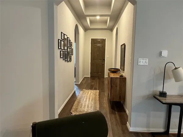 a view of front door and bedroom