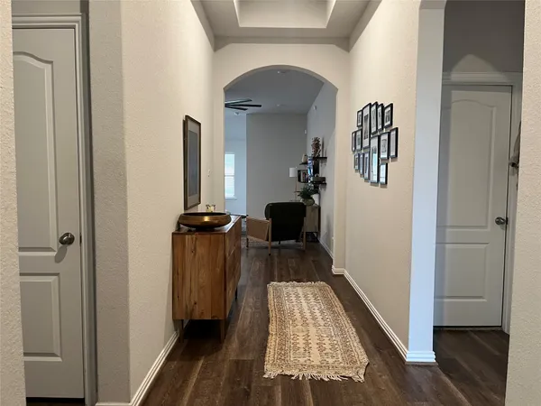a view of a hallway with a couch