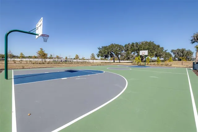 an aerial view of a house with garden patio and swimming pool
