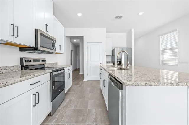 a view of a room with white walls