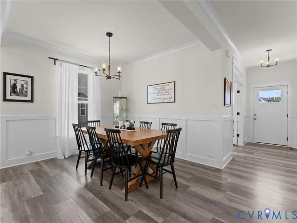 a living room with furniture fireplace and flat screen tv