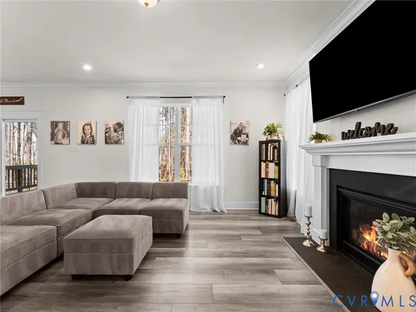 a large kitchen with kitchen island a large island in the center and stainless steel appliances