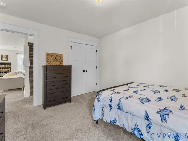 an aerial view of a house with outdoor space