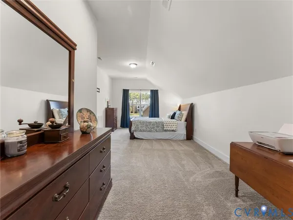 an aerial view of a house with outdoor space and pool view