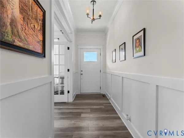 a view of a workspace with furniture