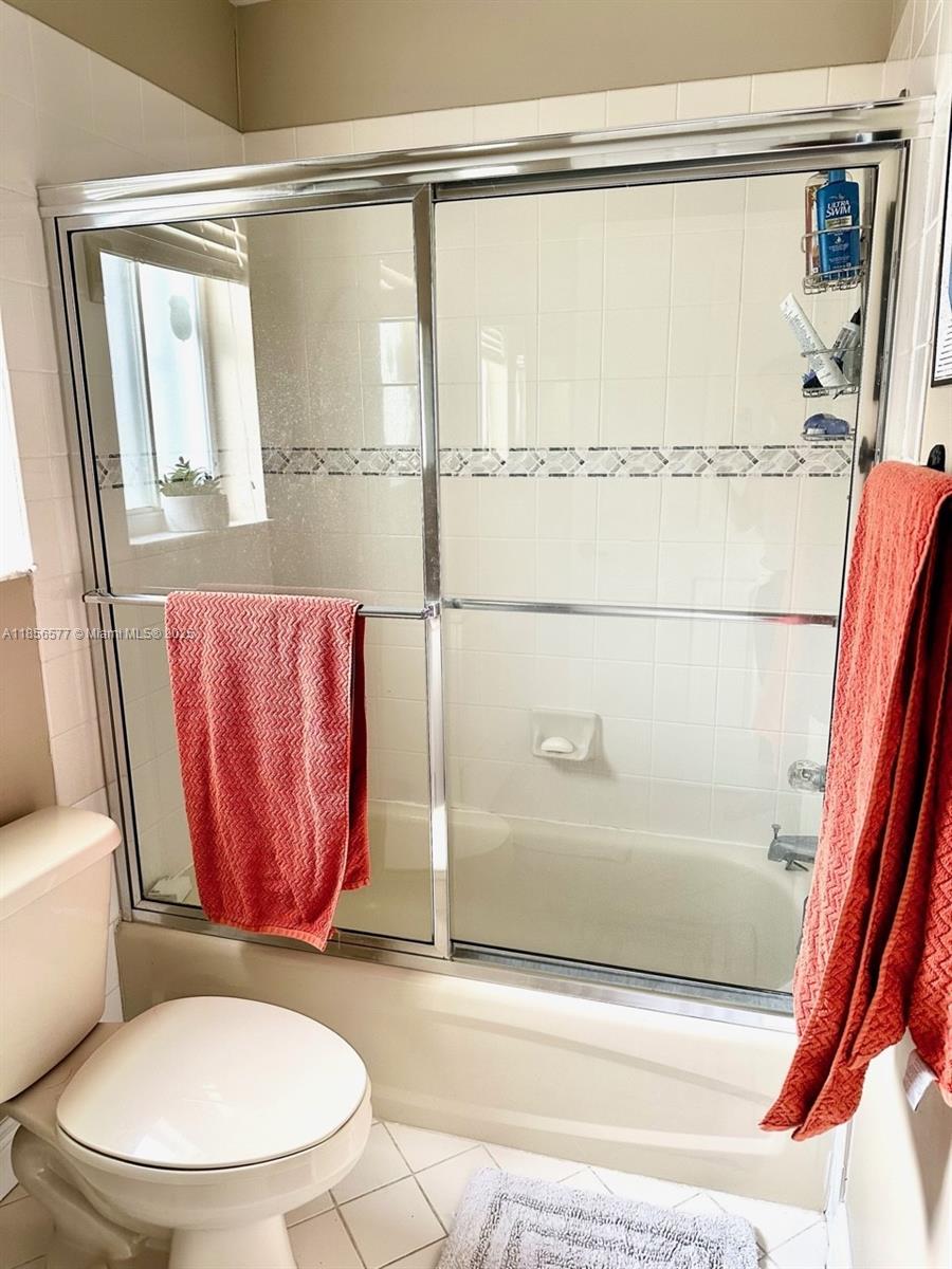 4370 Pine Ridge Court Weston, FL 33331 - Photo 23 of 39 a bathroom with a toilet and a shower