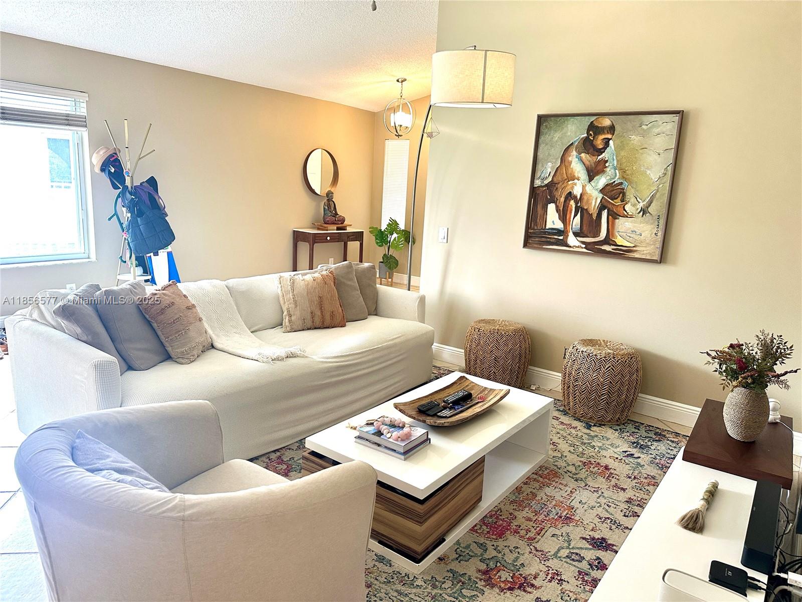 4370 Pine Ridge Court Weston, FL 33331 - Photo 8 of 39 a living room with furniture and window