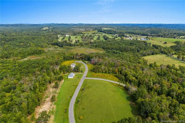 a view of an ocean and a mountain