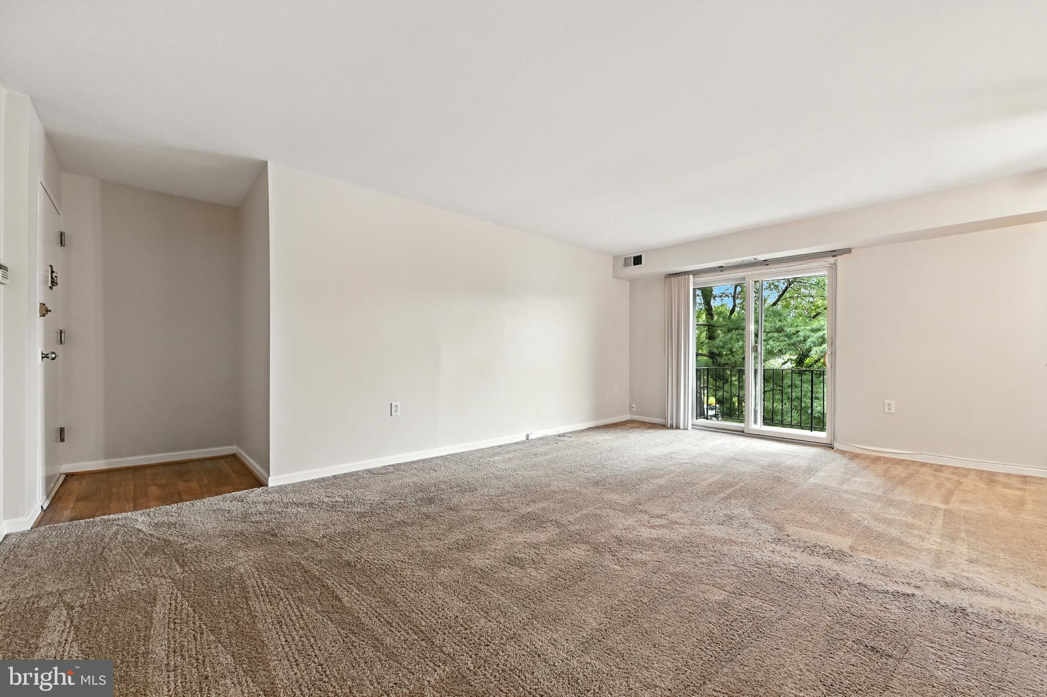 206 F Victor Parkway, Unit 206F Annapolis, MD 21403 - Photo 2 of 21 a view of an empty room with a window