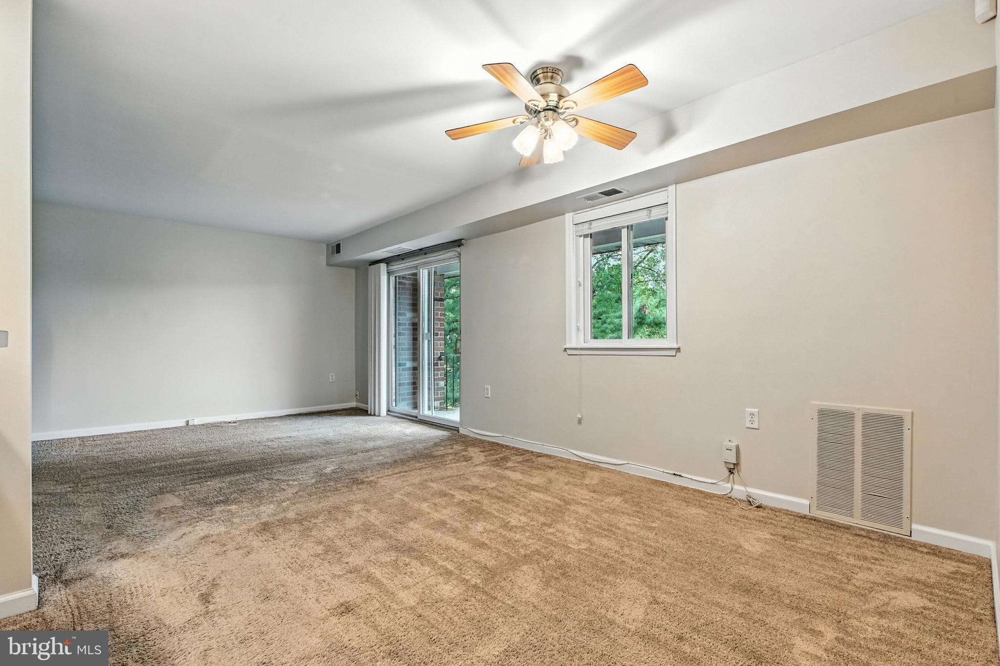 206 F Victor Parkway, Unit 206F Annapolis, MD 21403 - Photo 4 of 21 a view of an empty room with a window