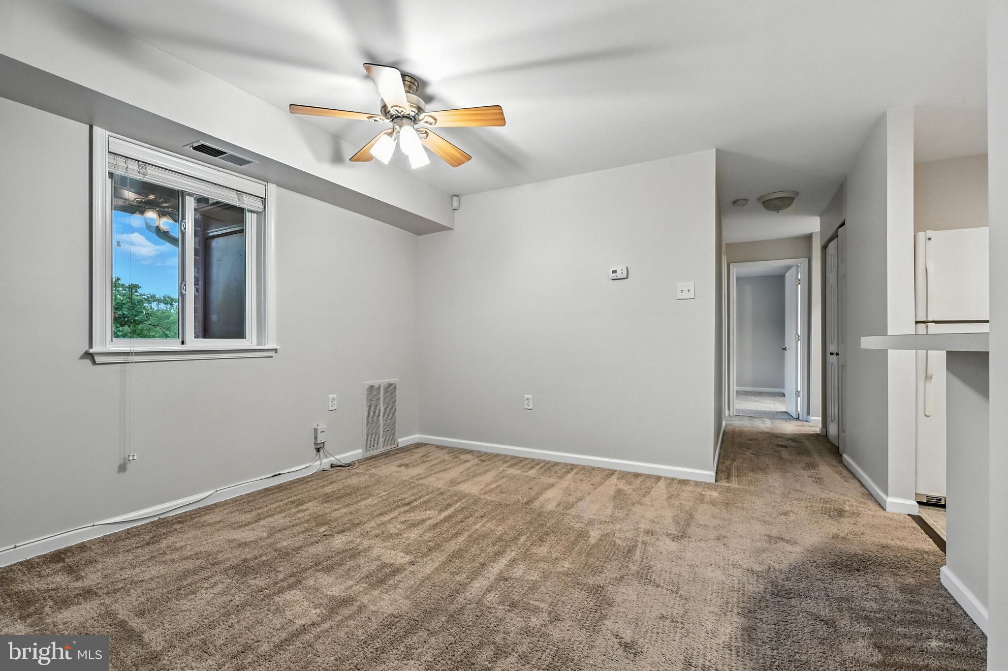 206 F Victor Parkway, Unit 206F Annapolis, MD 21403 - Photo 9 of 21 a view of an empty room with a window