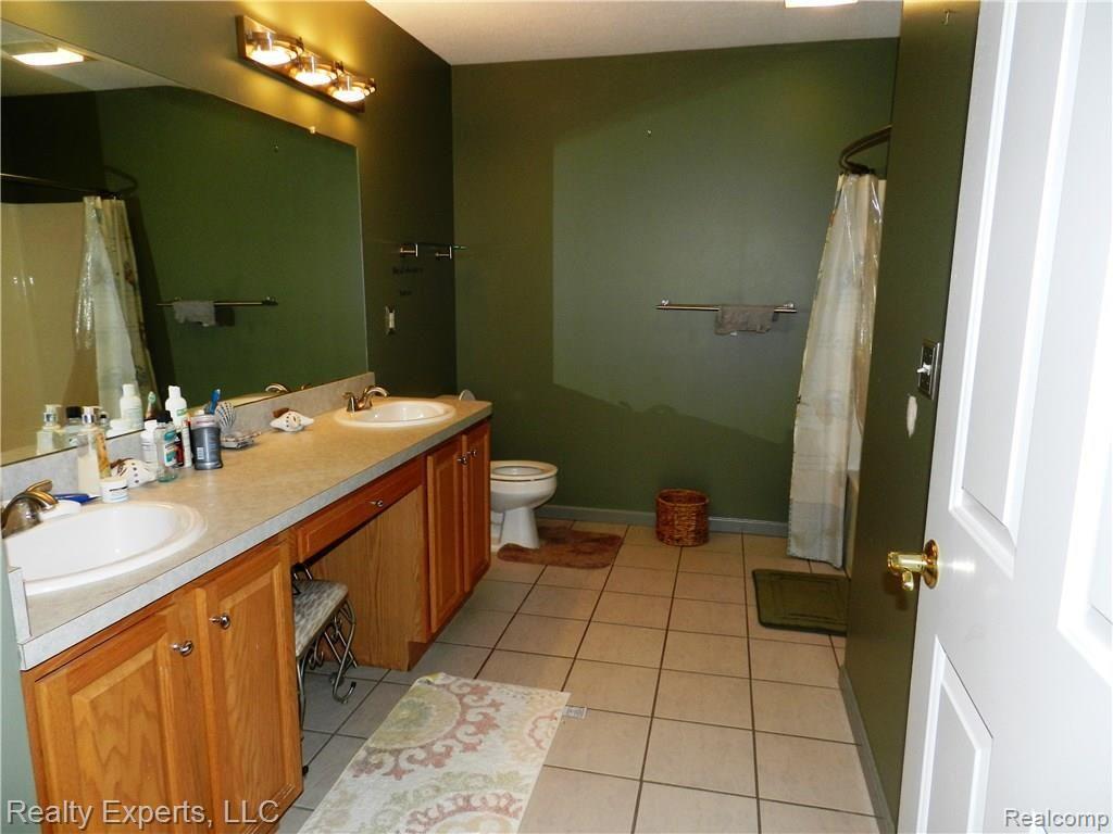 48073 Hull Road Belleville, MI 48111 - Photo 16 of 18 Upstairs main bathroom