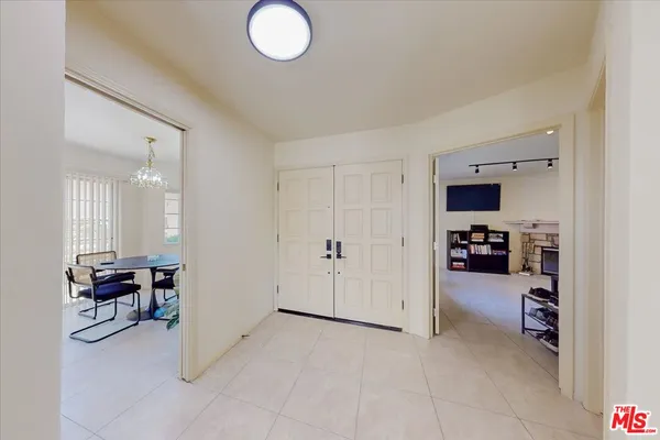 a view of a livingroom with furniture and storage