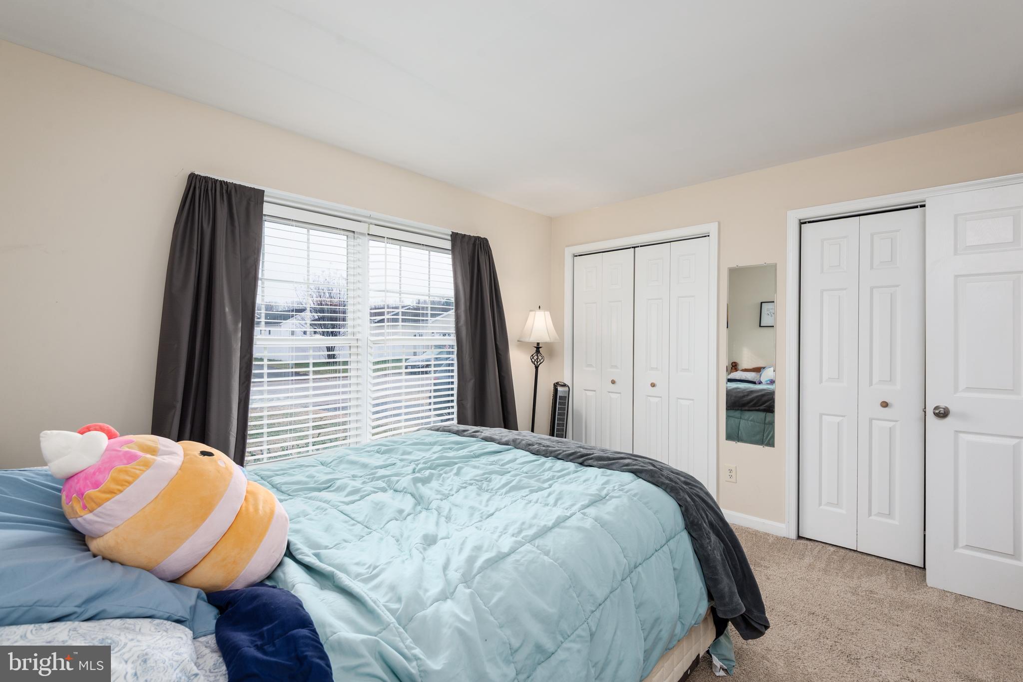 1 Oakview Court Ridgely, MD 21660 - Photo 15 of 26 a bedroom with a bed and wooden floor