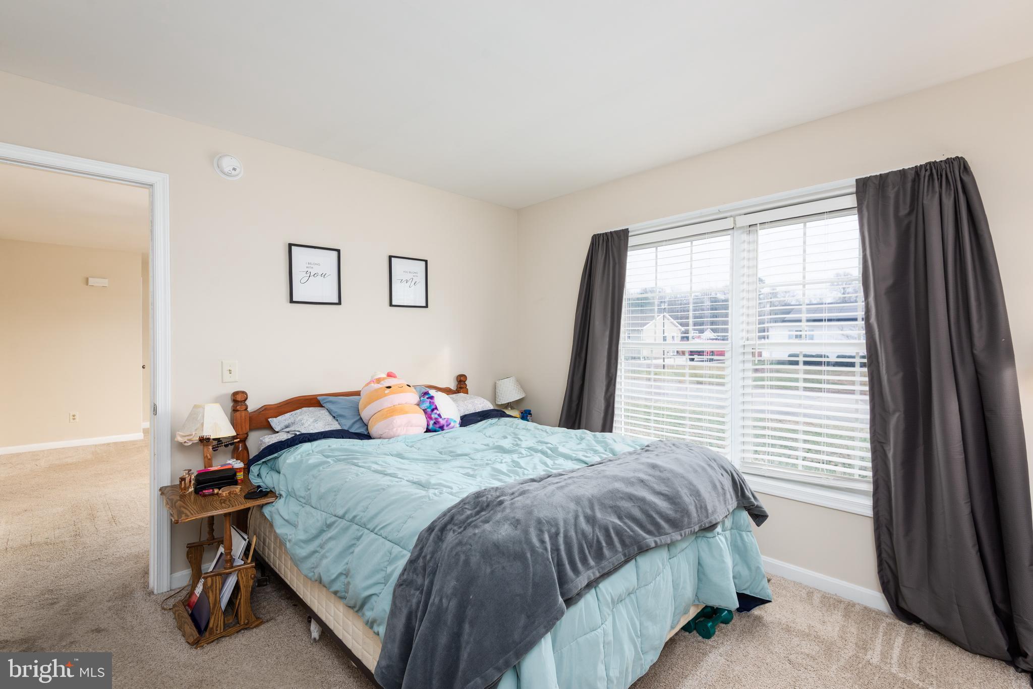 1 Oakview Court Ridgely, MD 21660 - Photo 16 of 26 a bedroom with a bed and a large window