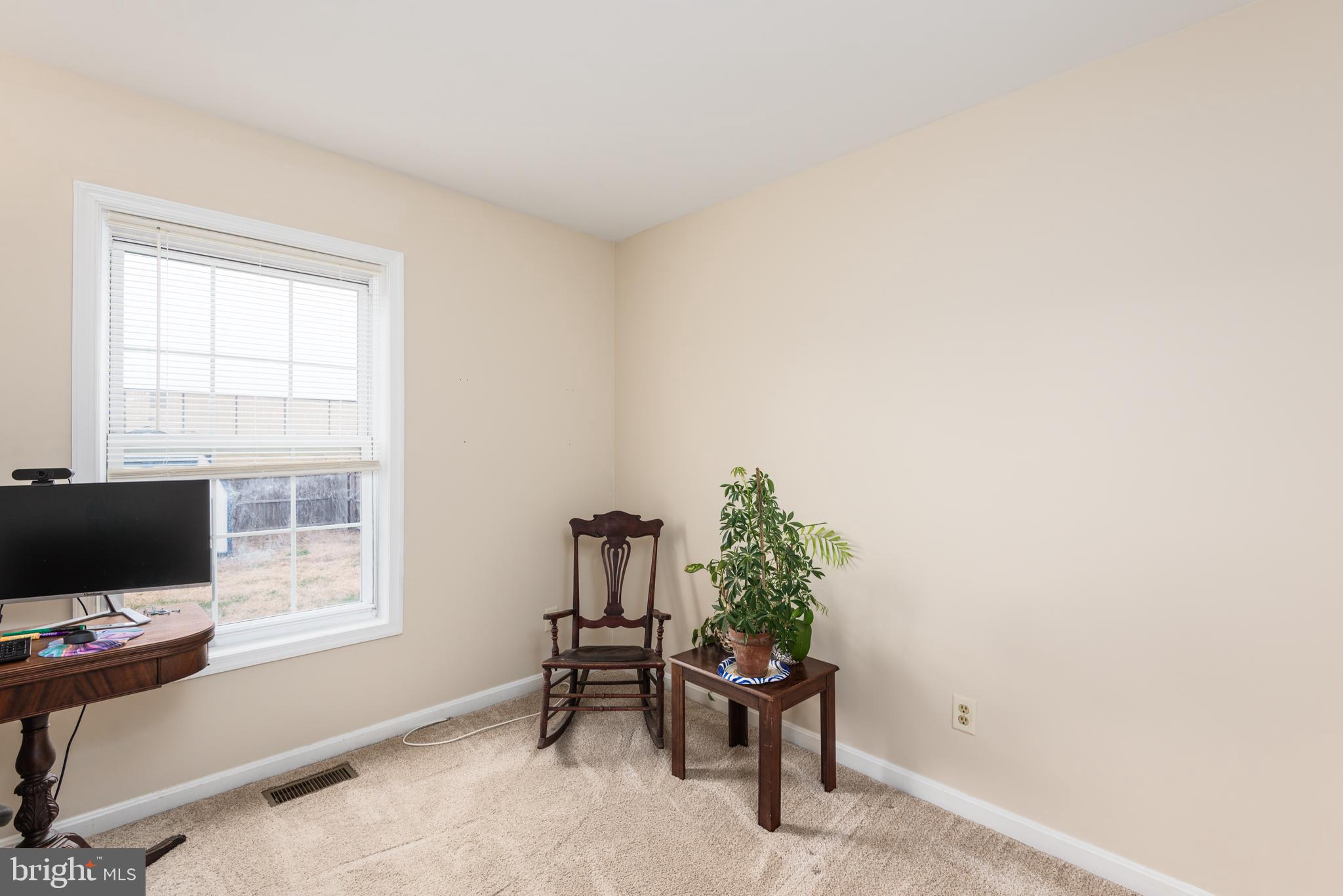 1 Oakview Court Ridgely, MD 21660 - Photo 19 of 26 a livingroom with a window and sitting area