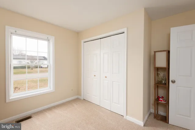 a house view with a backyard space