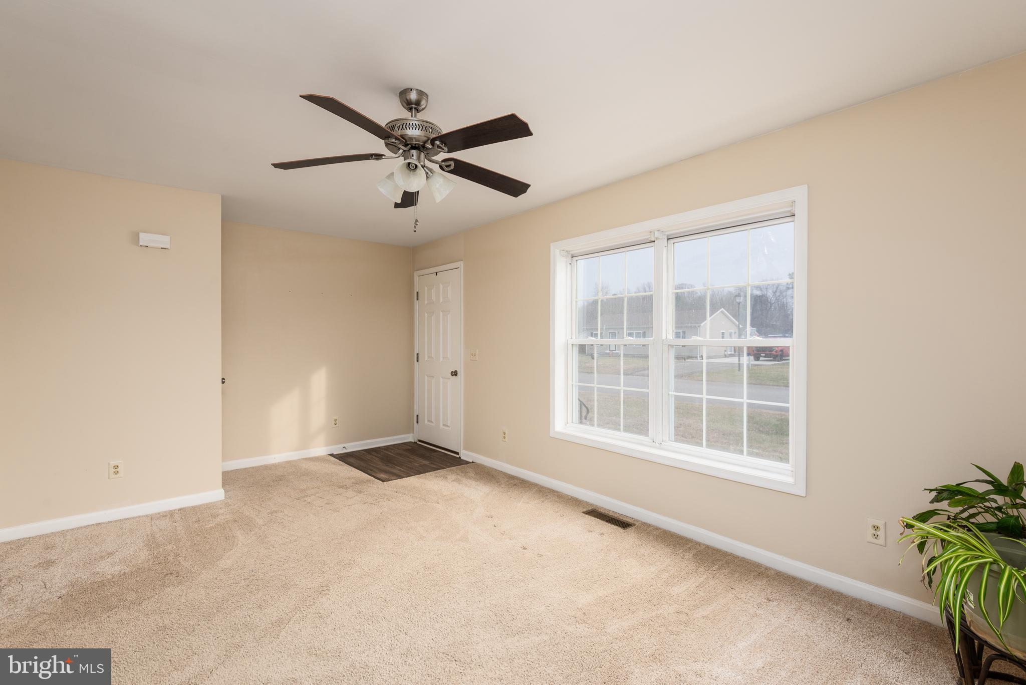 1 Oakview Court Ridgely, MD 21660 - Photo 5 of 26 a view of an empty room with a window
