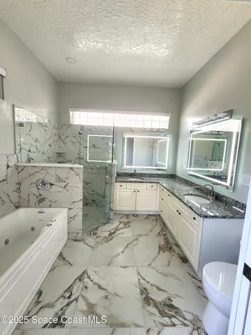 a view of a lake with a garden