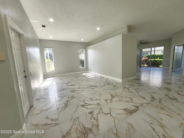 a view of livingroom with hardwood floor and window