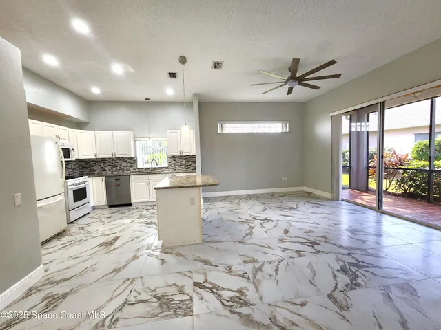 a view of a room with windows