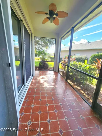 a kitchen with stainless steel appliances granite countertop a sink refrigerator and window