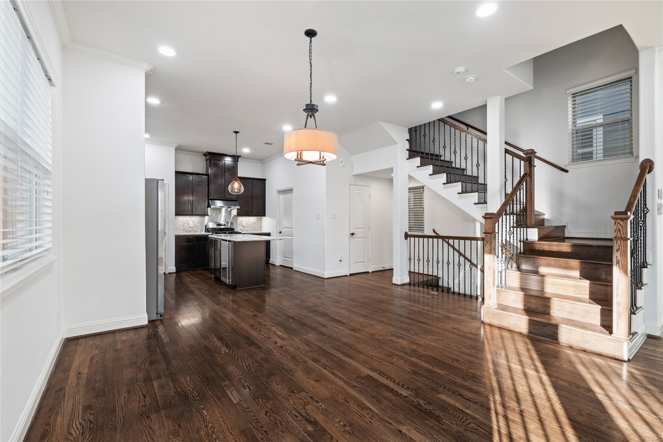 933 West 24th Street, Unit A Houston, TX 77008 - Photo 18 of 41 a view of a kitchen and wooden floor