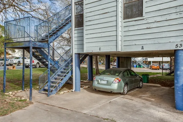 a car parked in front of a building