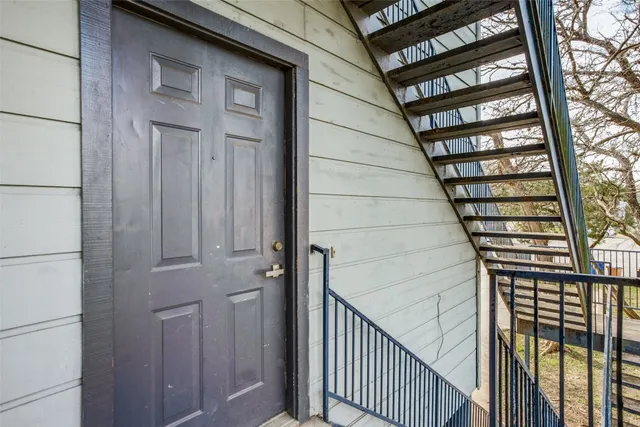 a view of a kitchen cabinets and wooden floor