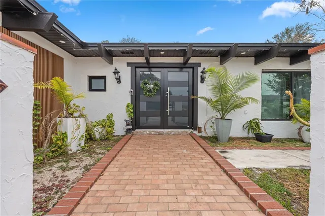 a front view of a house with a porch
