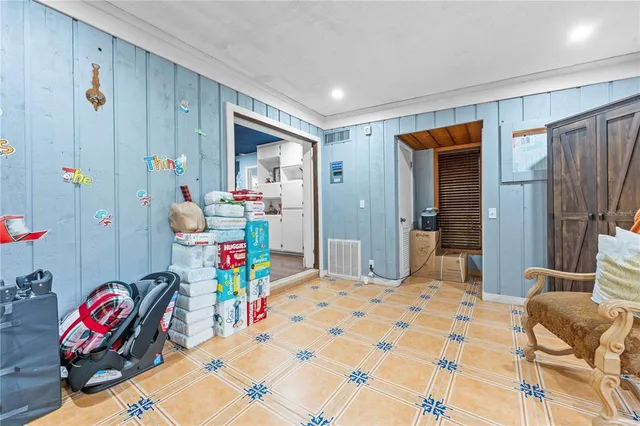 a hallway with washer and dryer