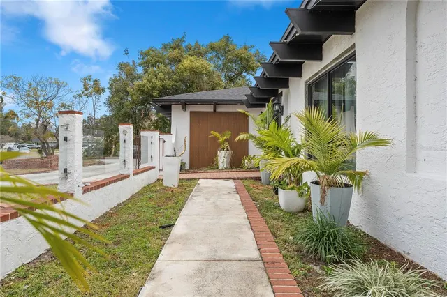 a view of hallway with wooden floor