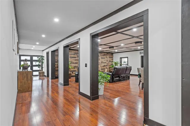 a room with furniture and a flat screen tv