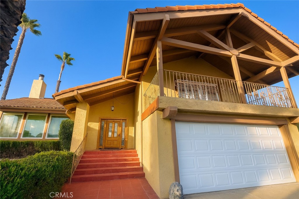 a view of a house with a door and a window