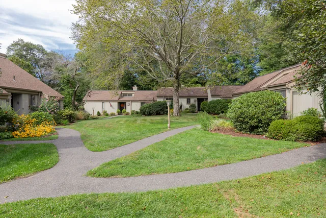 a house view with a garden space