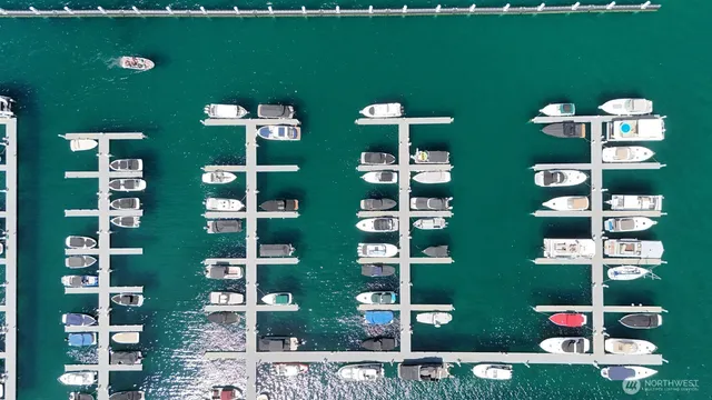 an aerial view of a house with outdoor space