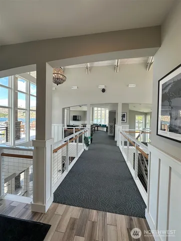 a view of a dining area with furniture and a chandelier