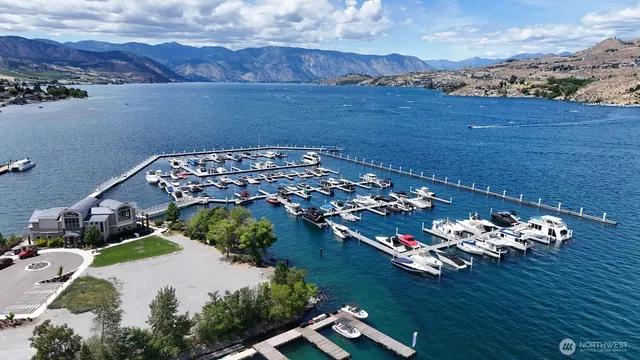 view of a pool with a yard