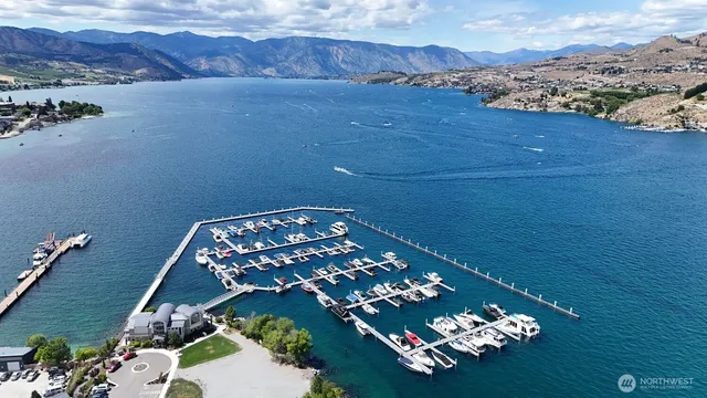 an aerial view of a house with a ocean view