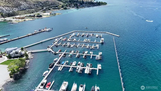an aerial view of lake residential houses with outdoor space