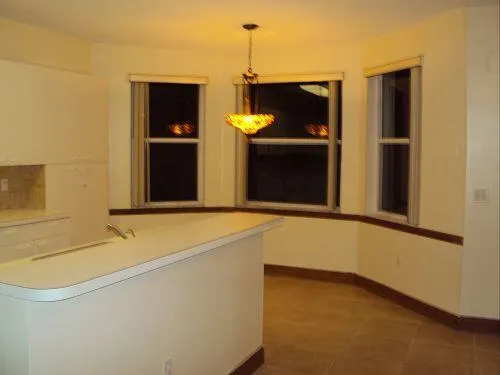 a bathroom with a tub and a sink