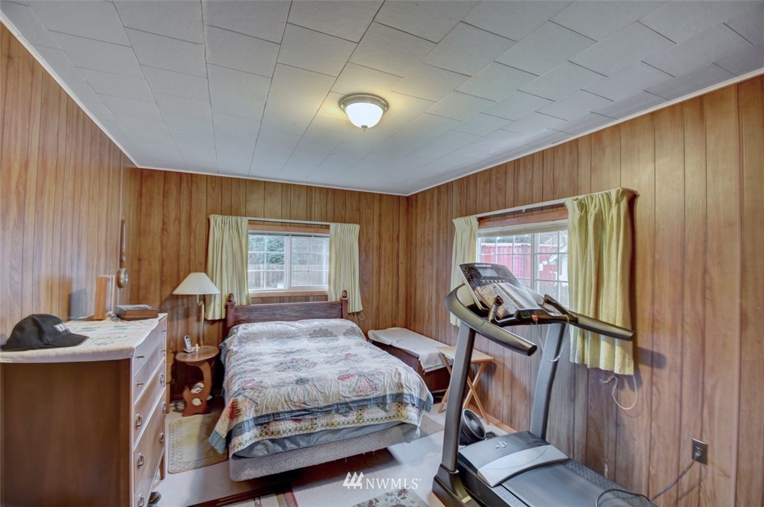 238 Stowell Road Salkum, WA 98582 - Photo 12 of 26 a bedroom with bed and a window