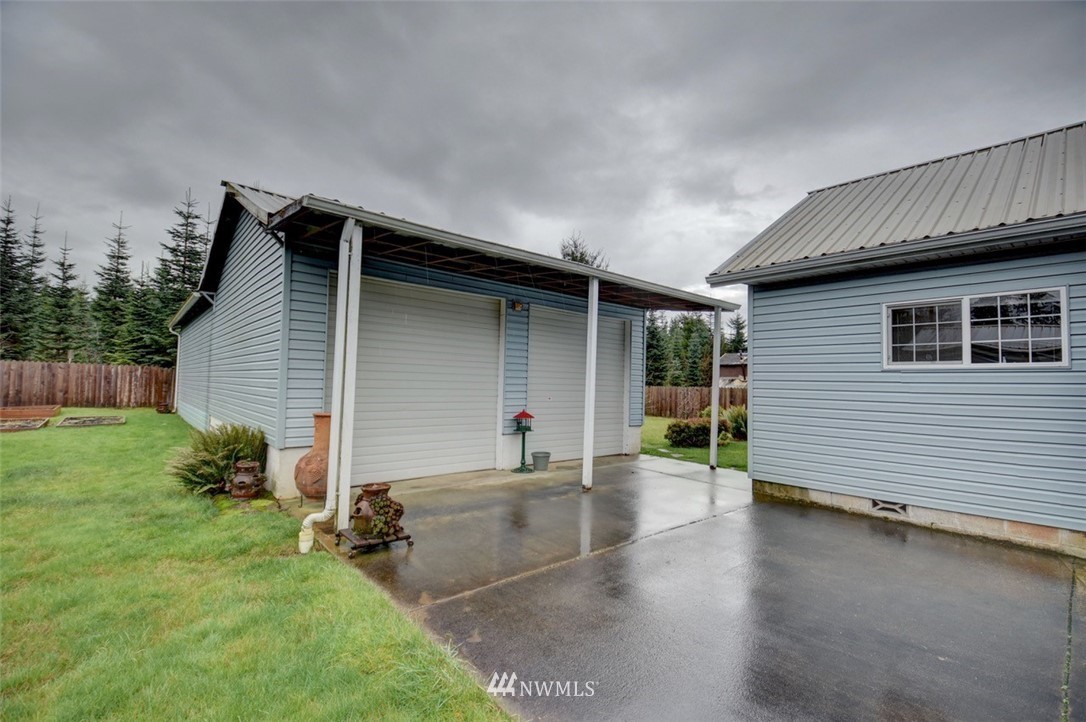 238 Stowell Road Salkum, WA 98582 - Photo 16 of 26 a view of a house with backyard and garden