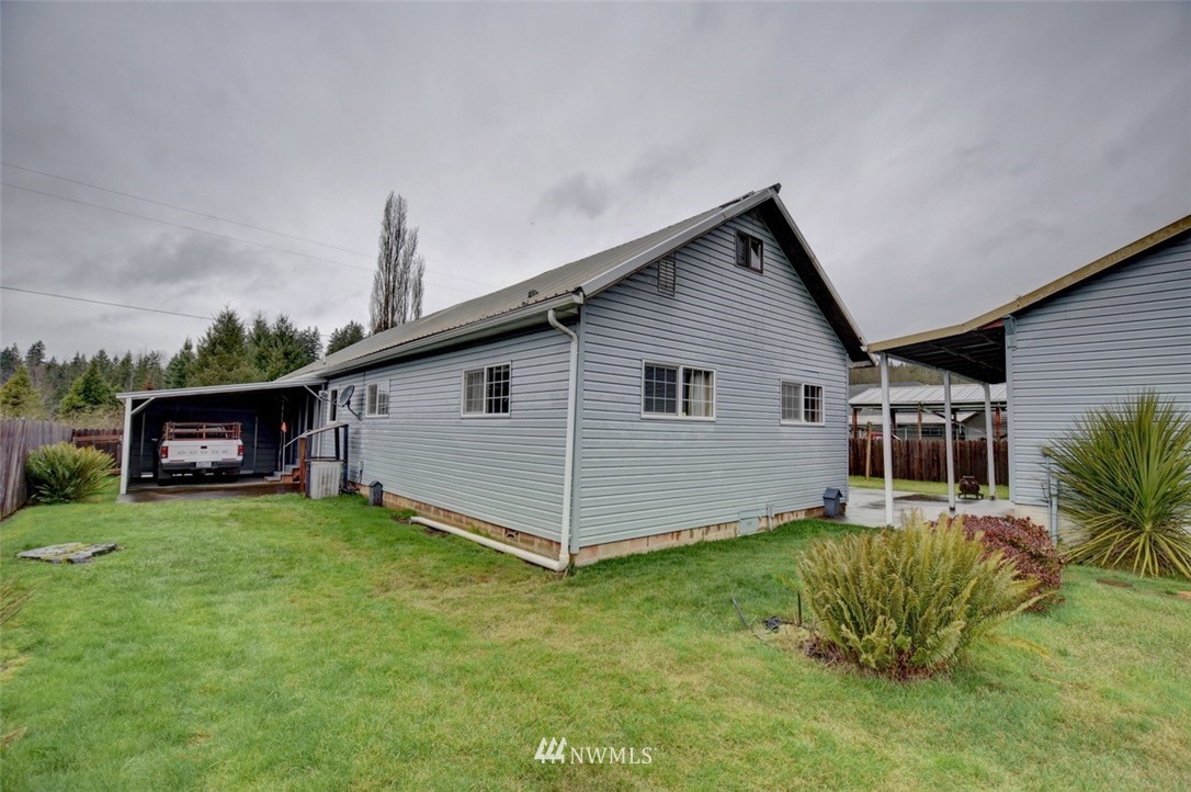 238 Stowell Road Salkum, WA 98582 - Photo 17 of 26 a view of a house with a yard and sitting area