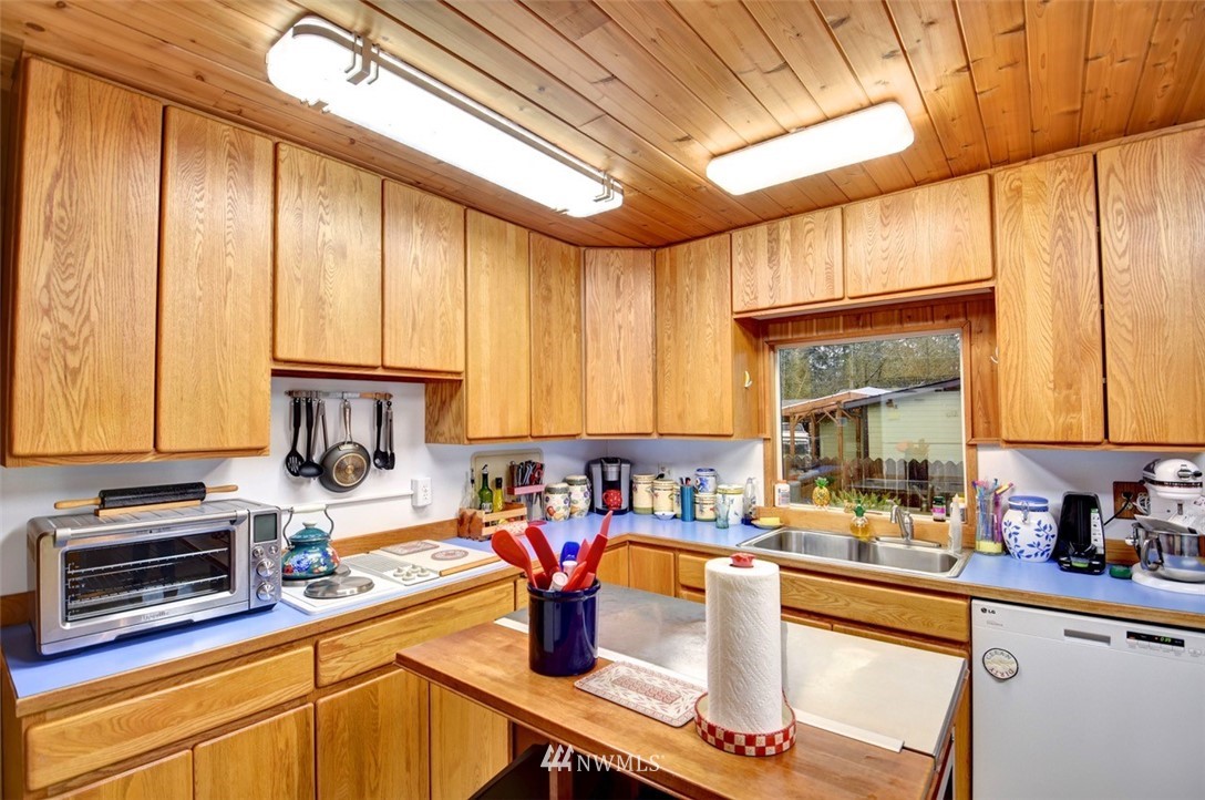 238 Stowell Road Salkum, WA 98582 - Photo 7 of 26 a kitchen with a large window and a counter space